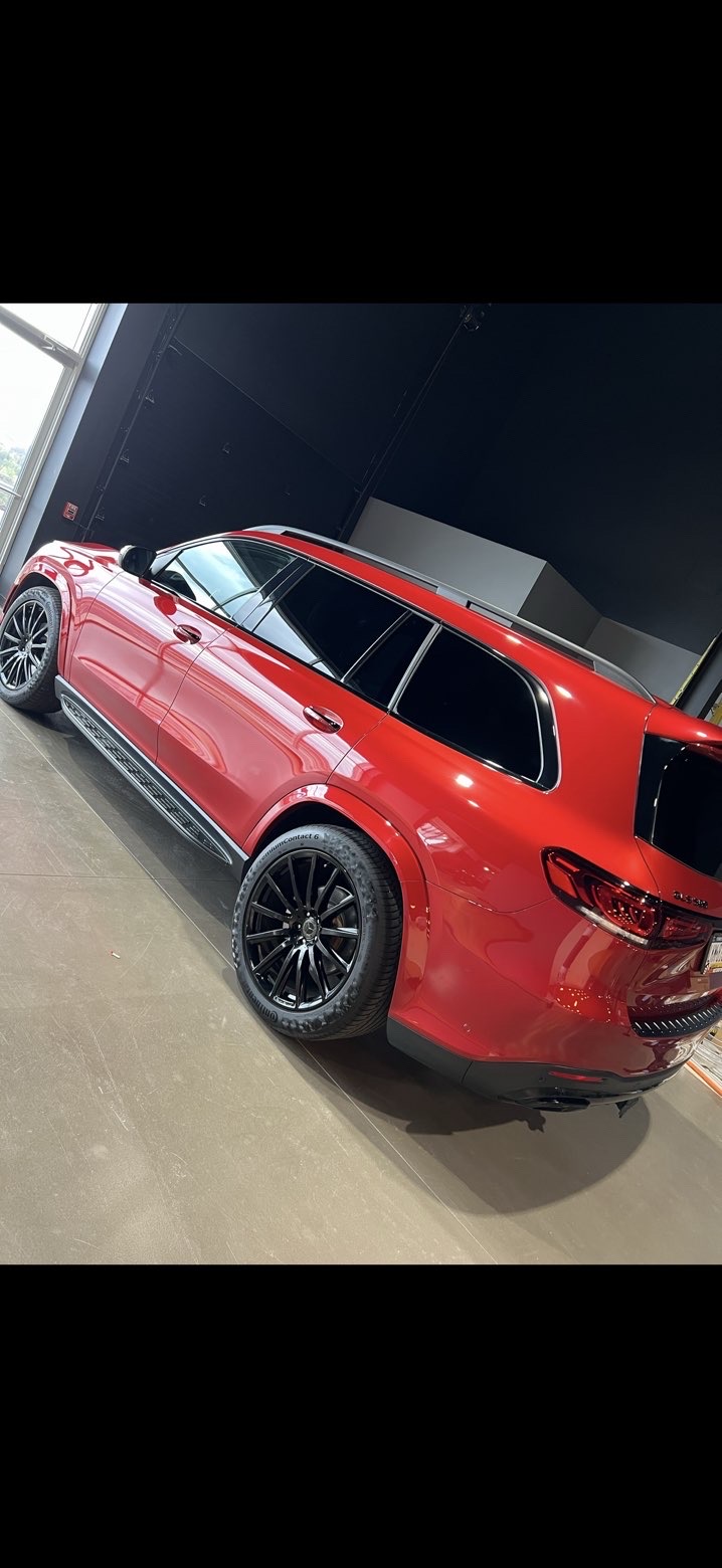 Red Mercedes GLE rear three-quarter, showroom finish